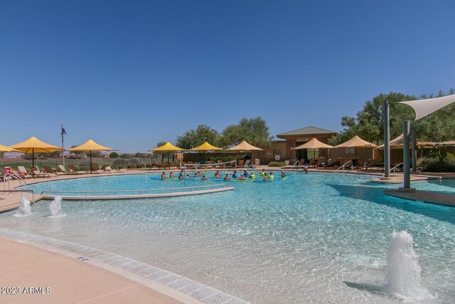 5771 W Cinder Brook Way, Florence, AZ 85132 - community pool featuring fence and a patio