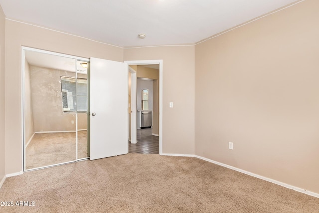 9233 E Neville Ave Unit 1127, Mesa, AZ 85209 - unfurnished bedroom featuring carpet flooring and baseboards