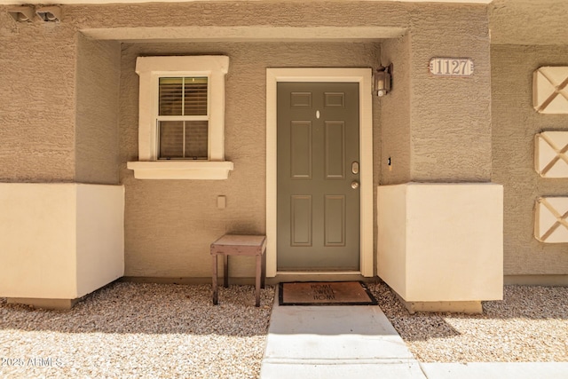 9233 E Neville Ave Unit 1127, Mesa, AZ 85209 - doorway to property with stucco siding