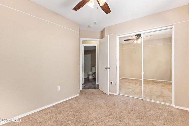 9233 E Neville Ave Unit 1127, Mesa, AZ 85209 - unfurnished bedroom featuring carpet flooring, ceiling fan, and a closet