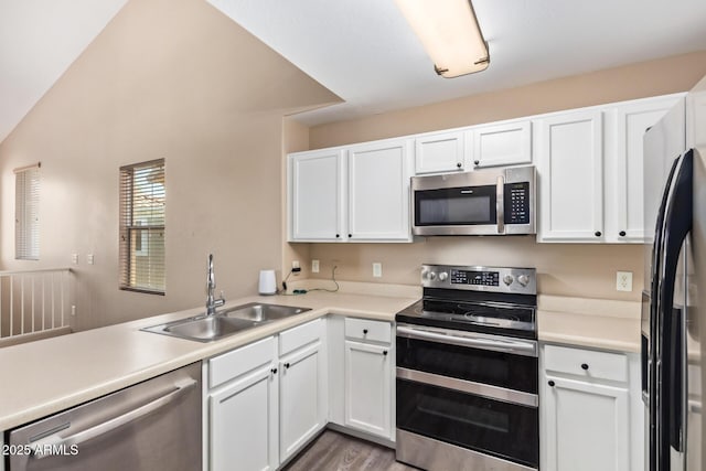 9233 E Neville Ave Unit 1127, Mesa, AZ 85209 - kitchen featuring stainless steel appliances, white cabinets, light countertops, and light wood-style floors