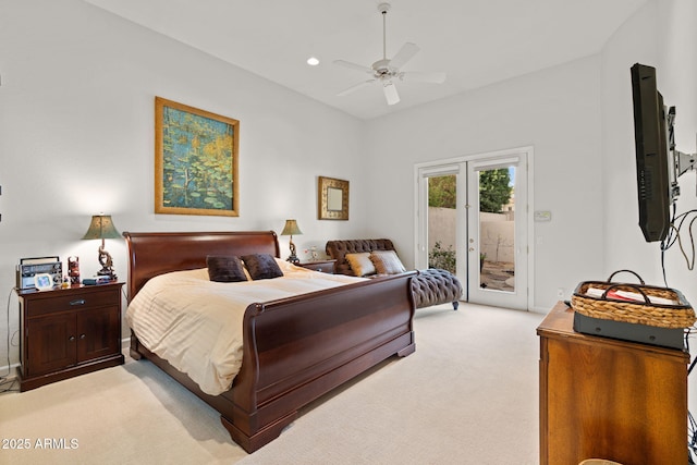 bedroom featuring access to outside, ceiling fan, and light colored carpet