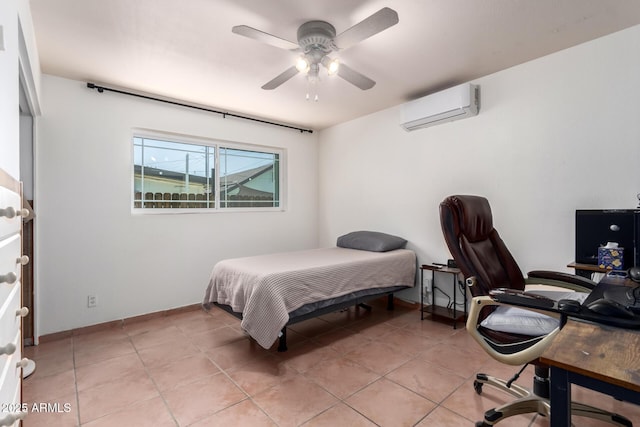 1308 N 66th St, Scottsdale, AZ 85257 - bedroom featuring a wall mounted air conditioner, an office area, light tile patterned flooring, and ceiling fan