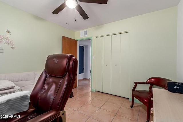 1308 N 66th St, Scottsdale, AZ 85257 - office area with light tile patterned flooring and a ceiling fan