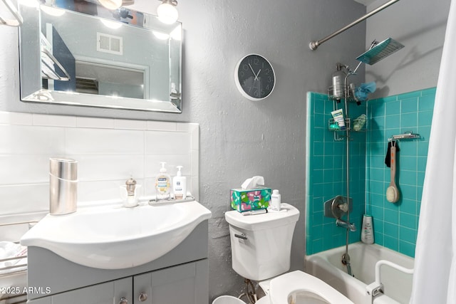 1308 N 66th St, Scottsdale, AZ 85257 - bathroom with vanity, shower / bath combo with shower curtain, and a textured wall