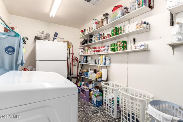 1308 N 66th St, Scottsdale, AZ 85257 - kitchen with freestanding refrigerator, washer / clothes dryer, and open shelves