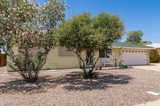 1308 N 66th St, Scottsdale, AZ 85257 - view of front of house featuring driveway and a garage