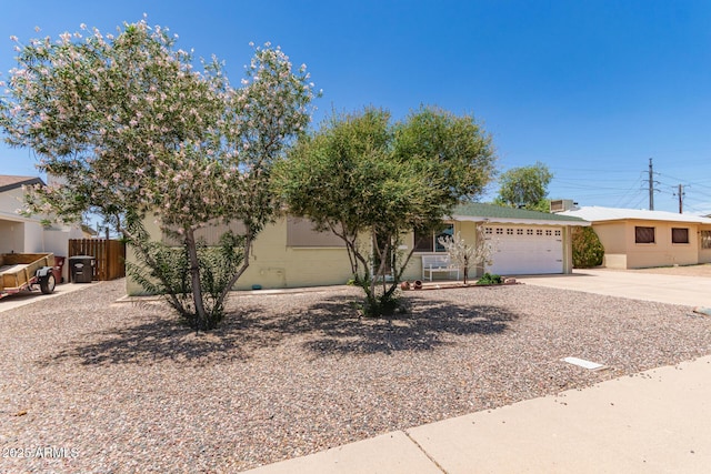 1308 N 66th St, Scottsdale, AZ 85257 - view of front of property featuring concrete driveway and a garage