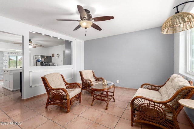 1308 N 66th St, Scottsdale, AZ 85257 - living area with a ceiling fan and light tile patterned floors