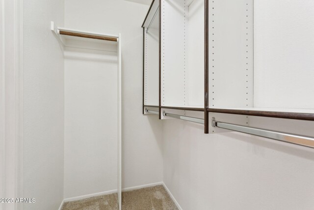 washroom featuring dark wood-type flooring and washer and dryer