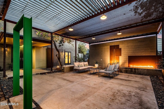 view of patio featuring a pergola and an outdoor hangout area