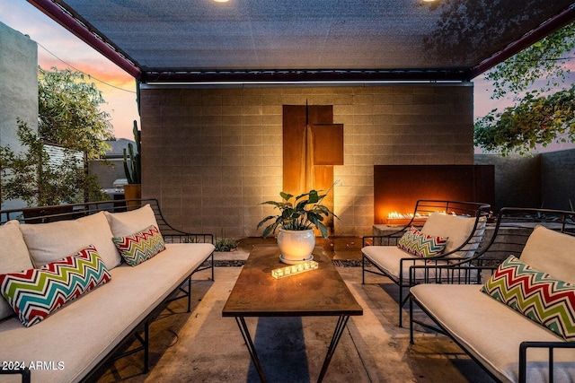 patio terrace at dusk with outdoor lounge area