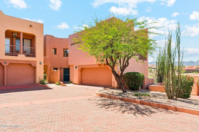 13227 N Mimosa Dr Unit 101, Fountain Hills, AZ 85268 - southwest-style home featuring stucco siding and decorative driveway