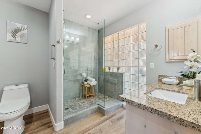 13227 N Mimosa Dr Unit 101, Fountain Hills, AZ 85268 - bathroom with vanity, wood finished floors, and a tile shower