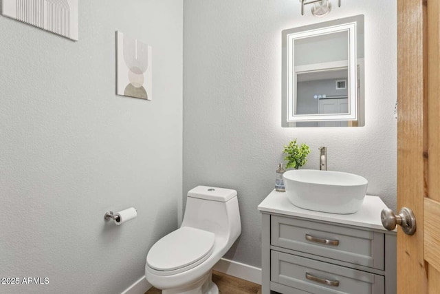 13227 N Mimosa Dr Unit 101, Fountain Hills, AZ 85268 - half bathroom with vanity and toilet