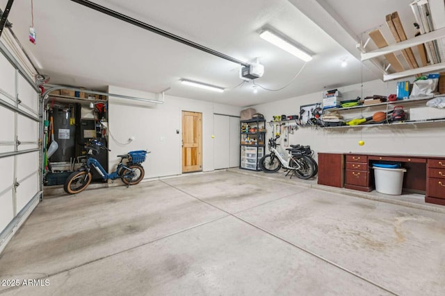 13227 N Mimosa Dr Unit 101, Fountain Hills, AZ 85268 - garage featuring a garage door opener and water heater