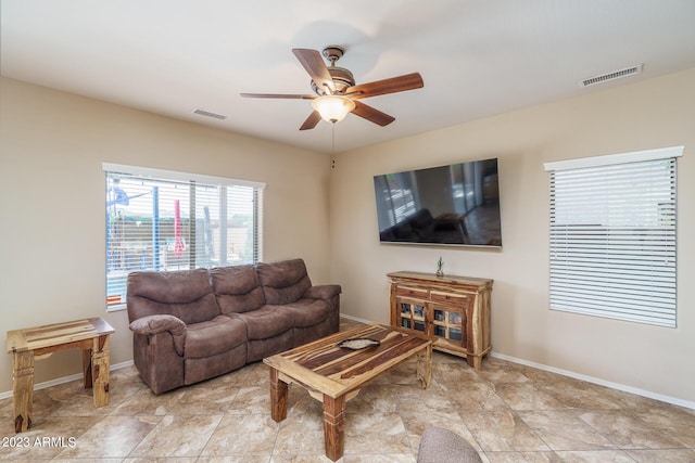 living room with ceiling fan