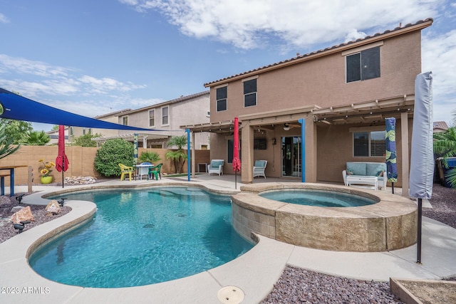 view of pool with an in ground hot tub, a pergola, and a patio area