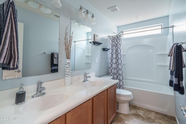 full bathroom featuring vanity, toilet, and shower / bath combo with shower curtain