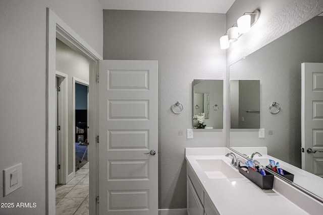 bathroom featuring vanity and tile patterned floors