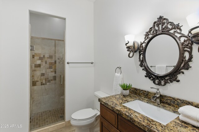 6146 E Dixileta Dr, Cave Creek, AZ 85331 - bathroom with vanity, a shower stall, and toilet