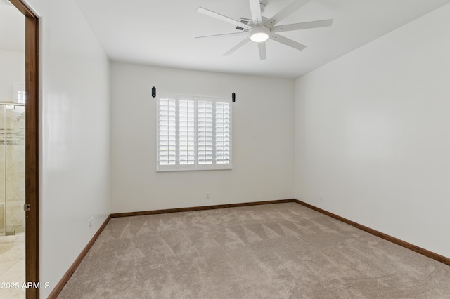 6146 E Dixileta Dr, Cave Creek, AZ 85331 - carpeted spare room with baseboards and a ceiling fan