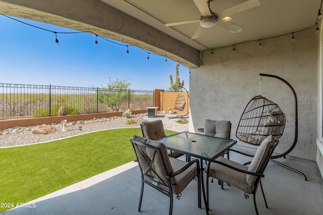 view of patio featuring ceiling fan