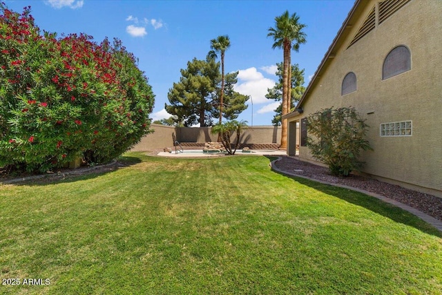 view of yard featuring a fenced backyard