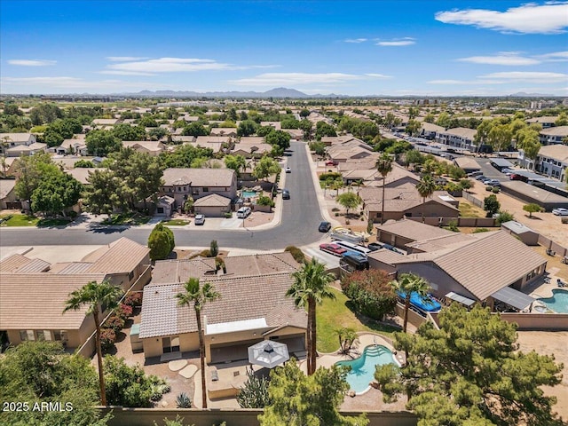 bird's eye view with a residential view and a mountain view