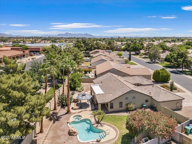 bird's eye view with a residential view and a mountain view