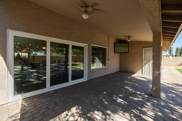 view of patio featuring ceiling fan