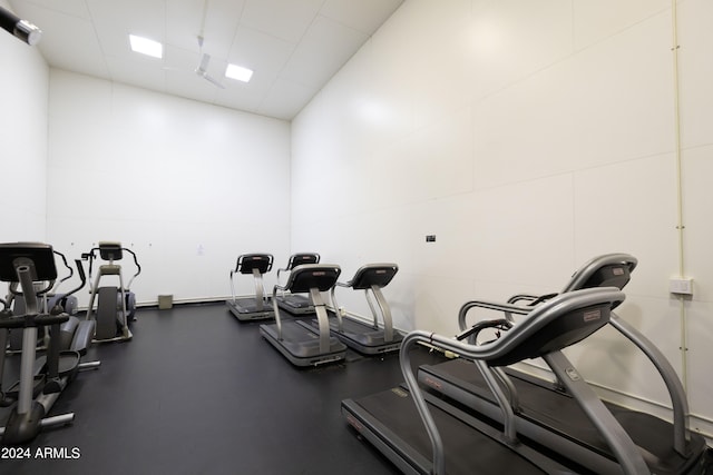 workout area featuring a drop ceiling