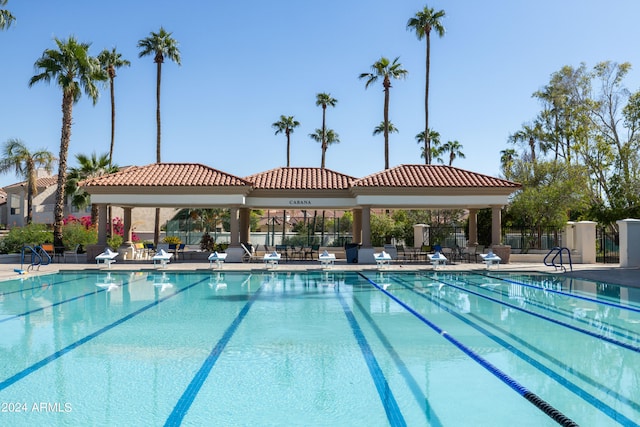 view of swimming pool featuring a gazebo and a patio