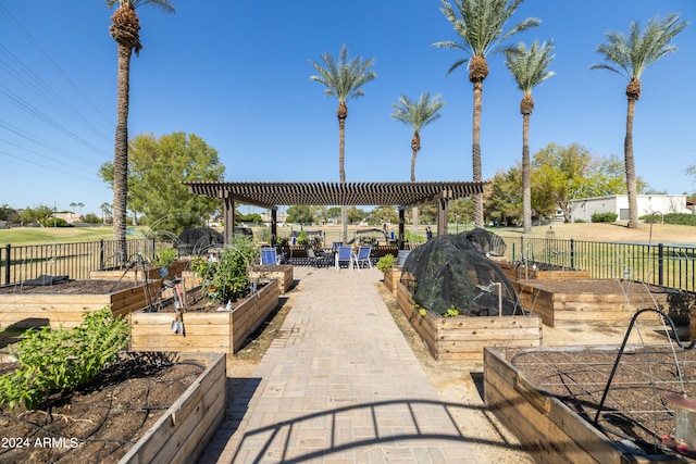 surrounding community featuring a pergola