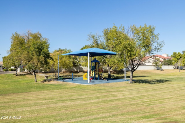 view of play area featuring a lawn