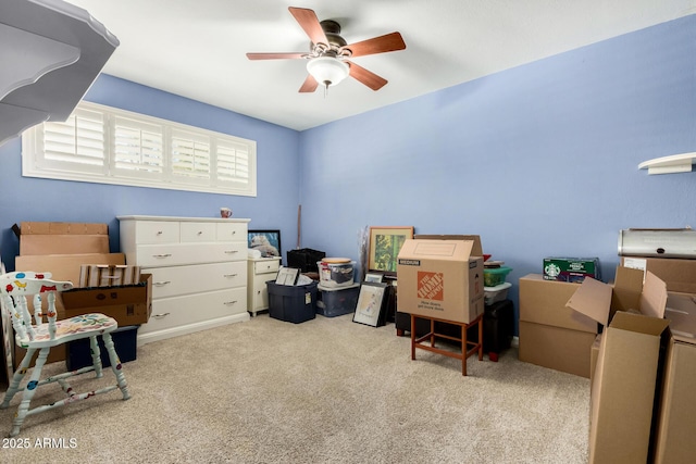 office with ceiling fan and light carpet