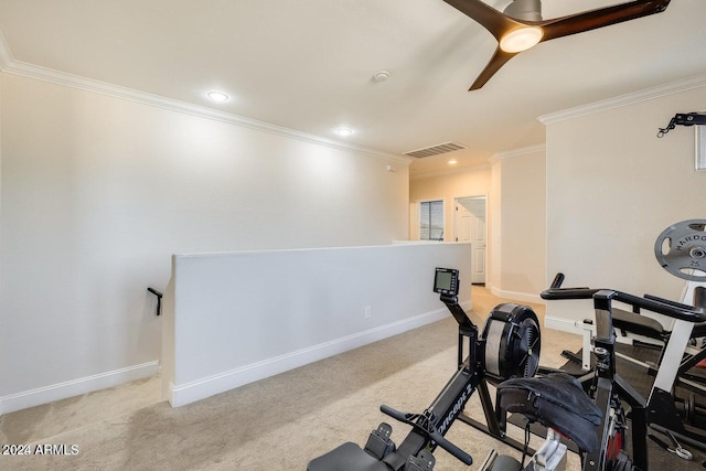 exercise area with visible vents, ceiling fan, baseboards, and carpet floors