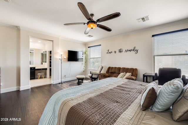 bedroom with visible vents, hardwood / wood-style floors, crown molding, baseboards, and ceiling fan