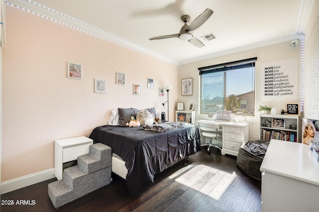 bedroom with a ceiling fan, baseboards, visible vents, dark wood-style flooring, and crown molding