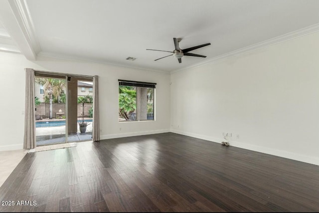 unfurnished room with dark wood finished floors, visible vents, and crown molding