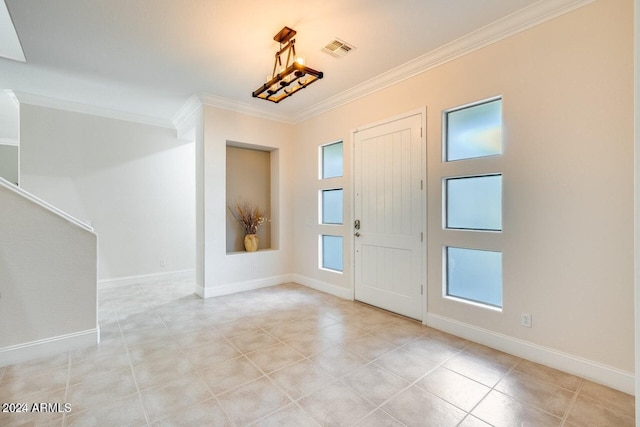 foyer entrance featuring light tile patterned floors, baseboards, visible vents, and ornamental molding