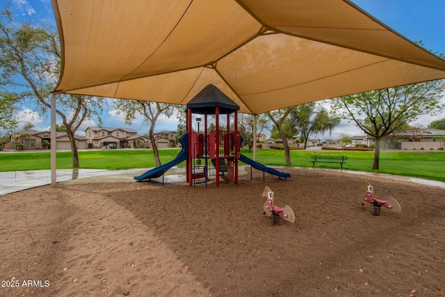 community play area with a yard