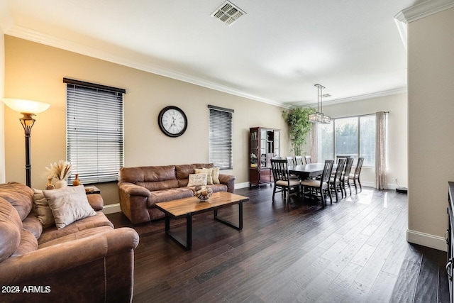 living room featuring dark wood-style floors, crown molding, and baseboards