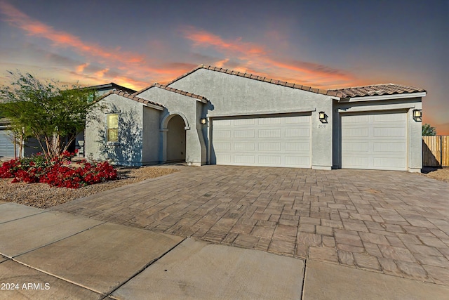 2050 E Piedmont Pl, Casa Grande, AZ 85122 - mediterranean / spanish home featuring a garage