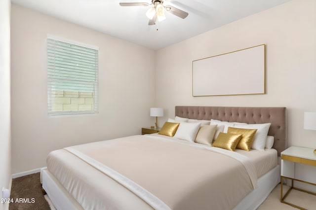 bedroom featuring ceiling fan and carpet floors