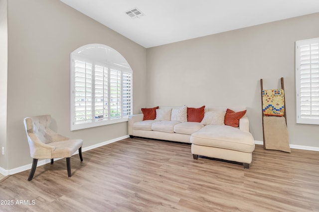 925 W San Marcos Dr, Chandler, AZ 85225 - living room featuring light wood finished floors and plenty of natural light