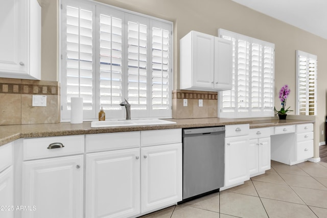 925 W San Marcos Dr, Chandler, AZ 85225 - kitchen with stainless steel dishwasher, backsplash, healthy amount of natural light, and light tile patterned floors