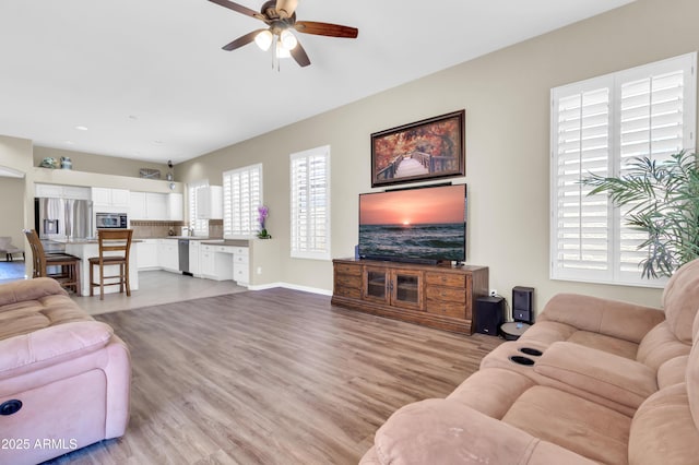 925 W San Marcos Dr, Chandler, AZ 85225 - living area with ceiling fan and light wood finished floors