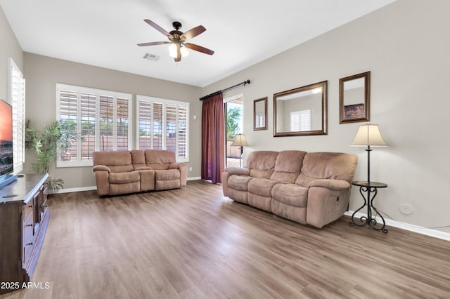 925 W San Marcos Dr, Chandler, AZ 85225 - living room with a ceiling fan and wood finished floors