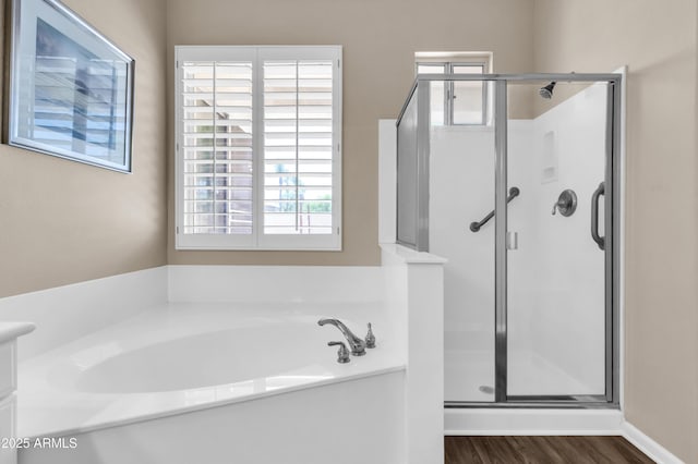 925 W San Marcos Dr, Chandler, AZ 85225 - bathroom featuring a shower stall, a bath, and wood finished floors